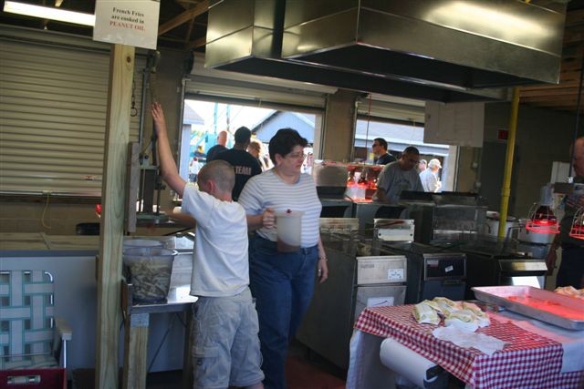 Charyl Hill at the french fry stand during the 2008 carnival.  Photo by R. Panos