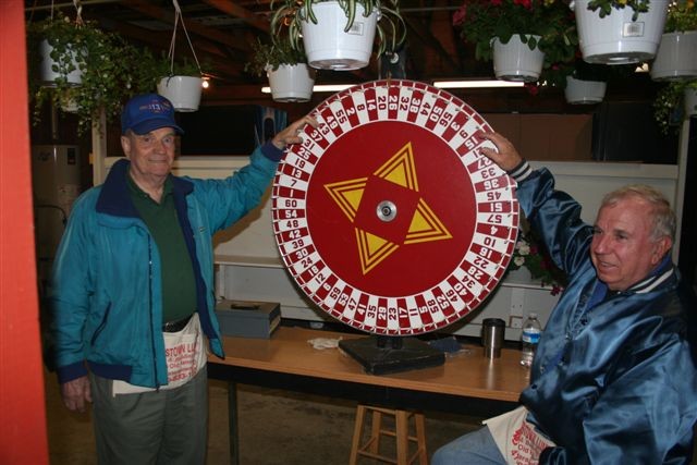 Clarence Souders and Art Brauning at the plant wheel during the 2008 carnival. Photo by R. Panos