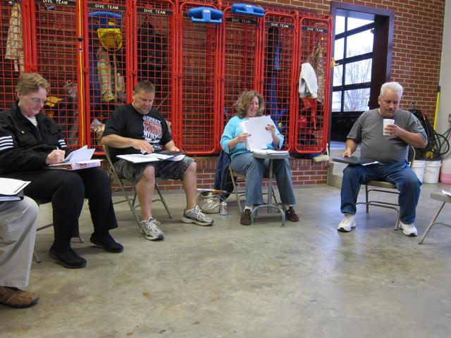 The Board of Directors meets in the Utility 13 engine bay on April 15, 2013.