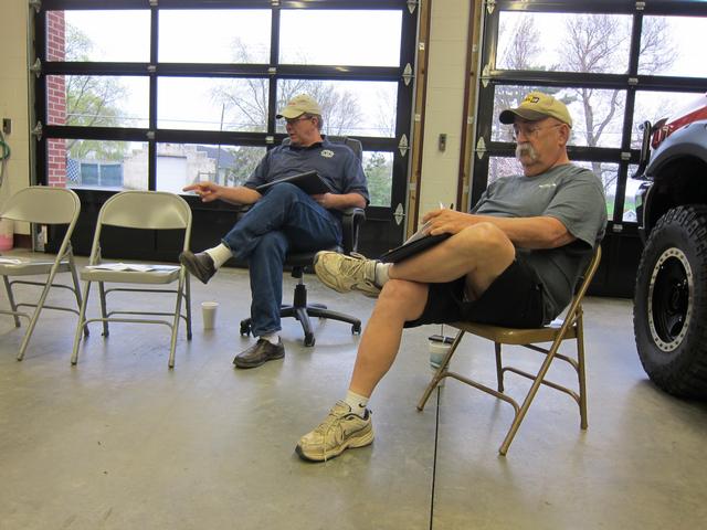 President Bollinger leads the Board of Directors meeting in the Utility 13 engine bay on April 15, 2013.